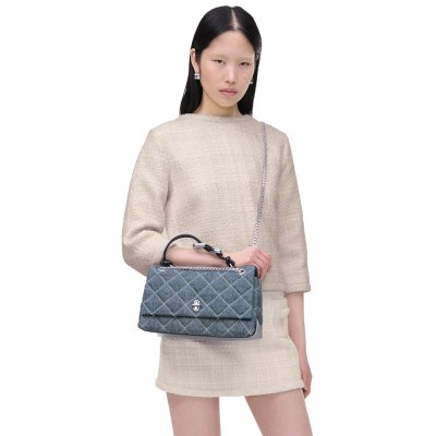 THE QUILTED DENIM DUAL CONVERTIBLE SHOULDER BAG